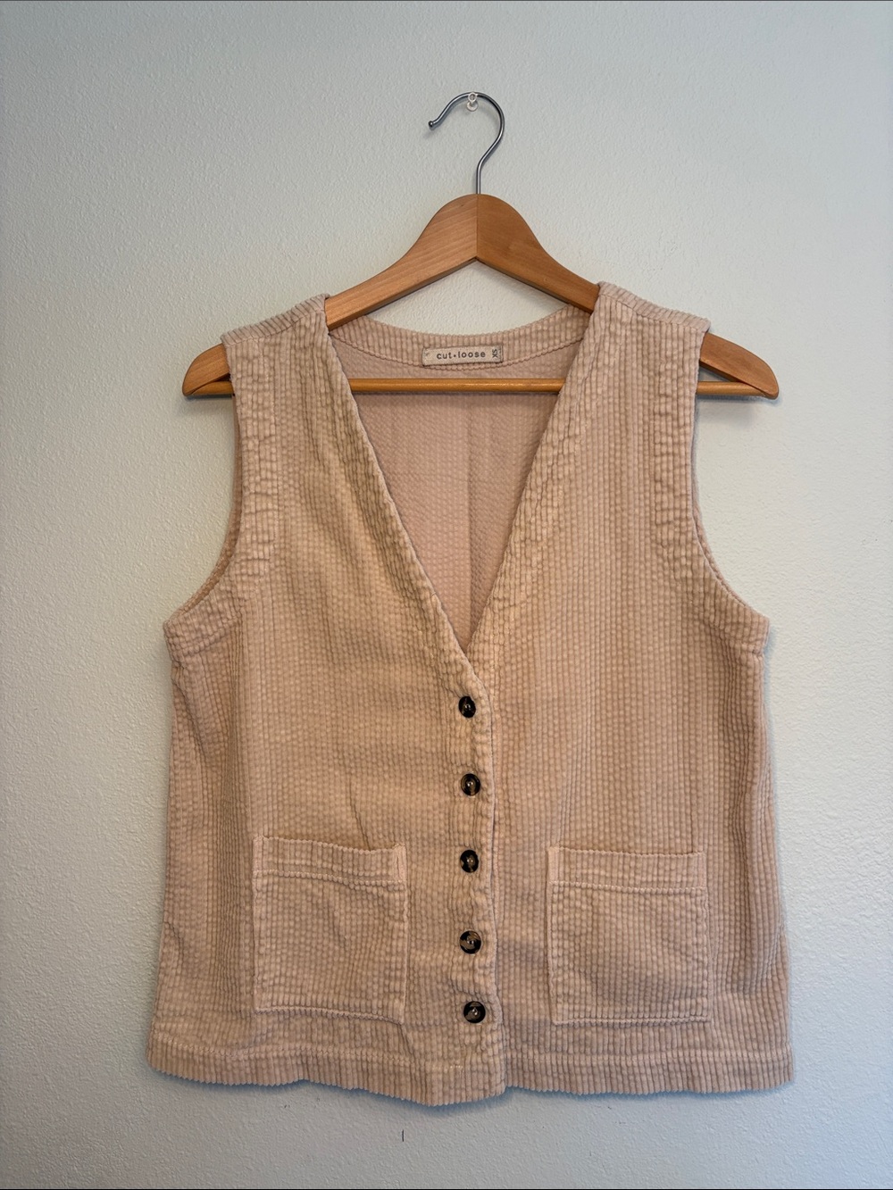 cut loose corduroy button-front vest in beige